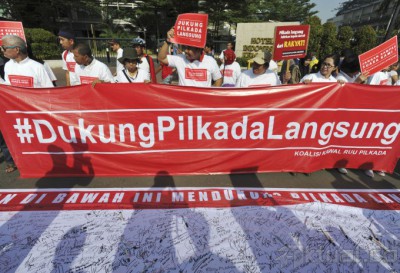 Aksi Dukungan Pengunjung CFD Dukung Pilkada Langsung