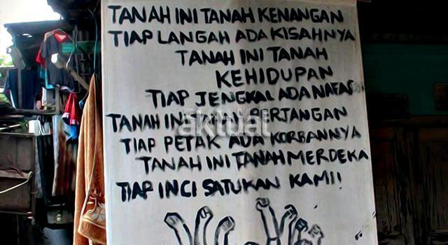 Mural penolakan penggusuran didepan rumah dikawasan Bukit Duri, Jakarta. (ilustrasi/aktual.com)
