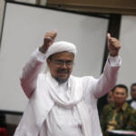 Ketua Umum FPI Habib Muhammad Rizieq Shihab menjadi saksi di persidangan ke-12 kasus dugaan penistaan agama dengan terdakwa Gubernur DKI Jakarta, Basuki T Purnama (Ahok) yang digelar oleh Pengadilan Negeri Jakarta Utara di Auditorum Kementerian Pertanian, Jakarta, Selasa (28/2/17). Pada sidang ke-12 kali ini Jaksa Penuntut Umum (JPU) menghadirkan dua saksi ahli yaitu Ketua Umum FPI, Habib Riziek Shihab dan Ahli pidana dari MUI, Abdul Chair Ramadhan. Sindonews.com-POOL/Isra Triansyah