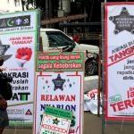 Sosialisasi tolak politik uang lewat kaos di Jakarta, Minggu (26/03/2017). Gerakan Relawan Independen mengajak seluruh warga DKI Jakarta untuk menolak berbagai bentuk politik uang menjelang putaran kedua Pilkada DKI Jakarta 2017. AKTUAL/Munzir