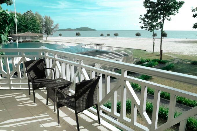 https://www.pexels.com/photo/black-wicker-bistro-set-on-white-terrace-near-ocean-133920/