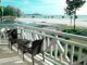 https://www.pexels.com/photo/black-wicker-bistro-set-on-white-terrace-near-ocean-133920/