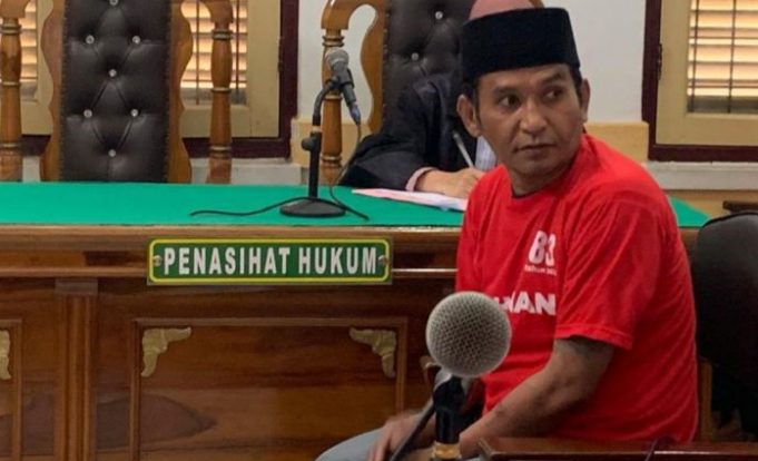 Terdakwa Ridwan Nasution alias Ridho ketika mendengarkan tuntutan di ruang sidang Cakra IV, Pengadilan Negeri Medan, Selasa (29/10/2024) kemarin.