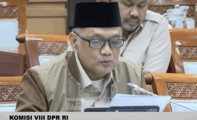 Tangkapan layar Menteri Haji (Menhaj) dan Umrah Mochamad Irfan Yusuf menyampaikan paparan dalam rapat kerja bersama Komisi VIII DPR RI di Kompleks Parlemen, Jakarta, Rabu (5/11/2025). ANTARA/Tri Meilani Ameliya.