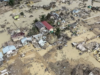 Penguburan Massal Korban Bencana: Bagaimana Fikih Menyikapi Situasi Darurat? Ilustrasi: Foto udara pasca banjir bandang di Kabupaten Aceh Tamiang Rabu (3/12/2025). ANTARA FOTO/Syifa Yulinnas