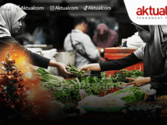 Kemenkeu Antisipasi Gejolak Harga Pangan Menjelang Nataru Ilustrasi - Pedagang di pasar melayani pembeli