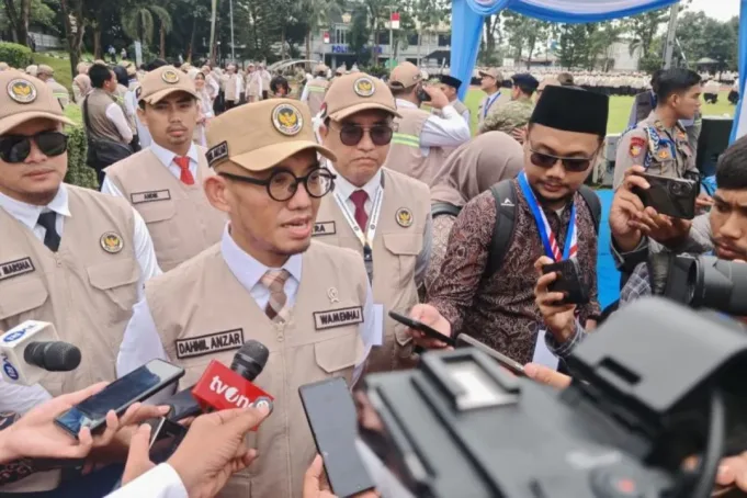 IMG-20260130-WA0018.jpg Wakil Menteri Haji dan Umrah Dahnil Anzar Simanjuntak usai pengukuhan petugas haji di Asrama Haji Pondok Gede, Jakarta, Jumat (30/1/2026). ANTARA/HO-Kemenhaj